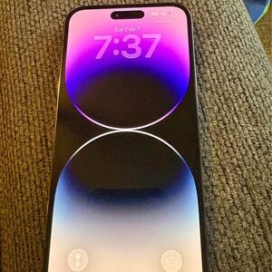 Apple Smartphone with Black and Purple Display